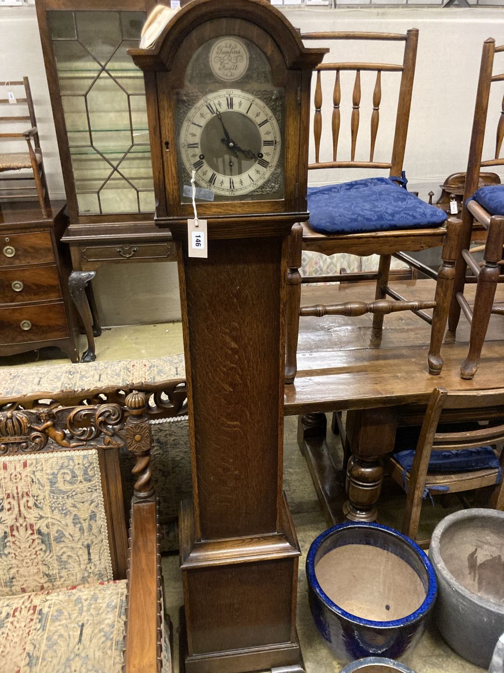A 1930s oak cased eight day striking and chiming longcase clock, height 169cm